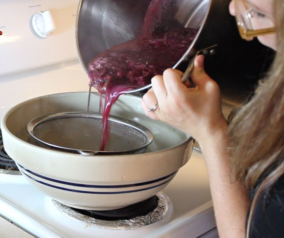 straining the mustang grape jelly juice