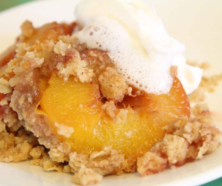 cooked peach halves with oatmeal crisp topping for the second of the peach recipes