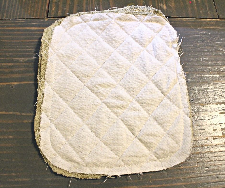 diamond quilting pattern on a drop cloth potholder