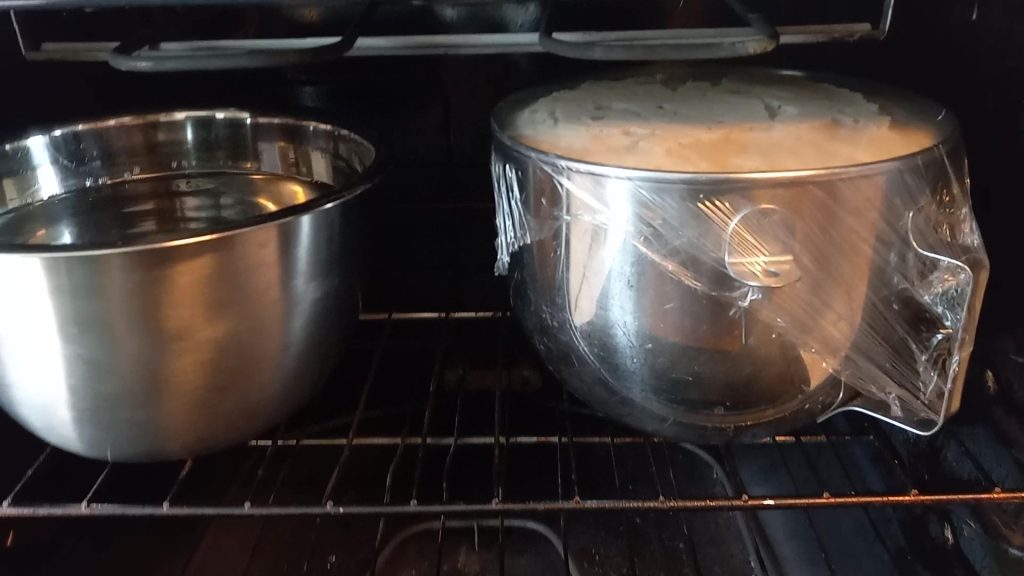 risen kolache dough in the oven