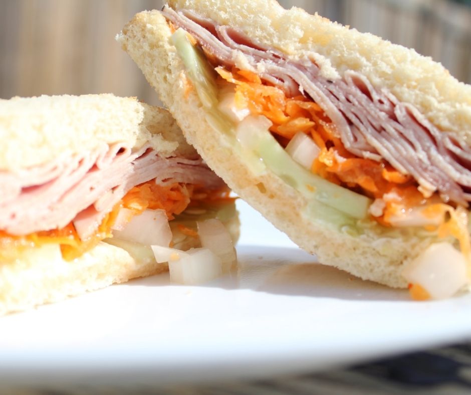 sandwich idea for summer with cucumber, ginger, carrots, onion, and ham on toast