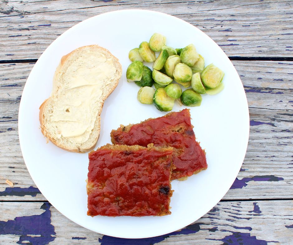 sheet pan meatloaf with brussels sprouts and french bread