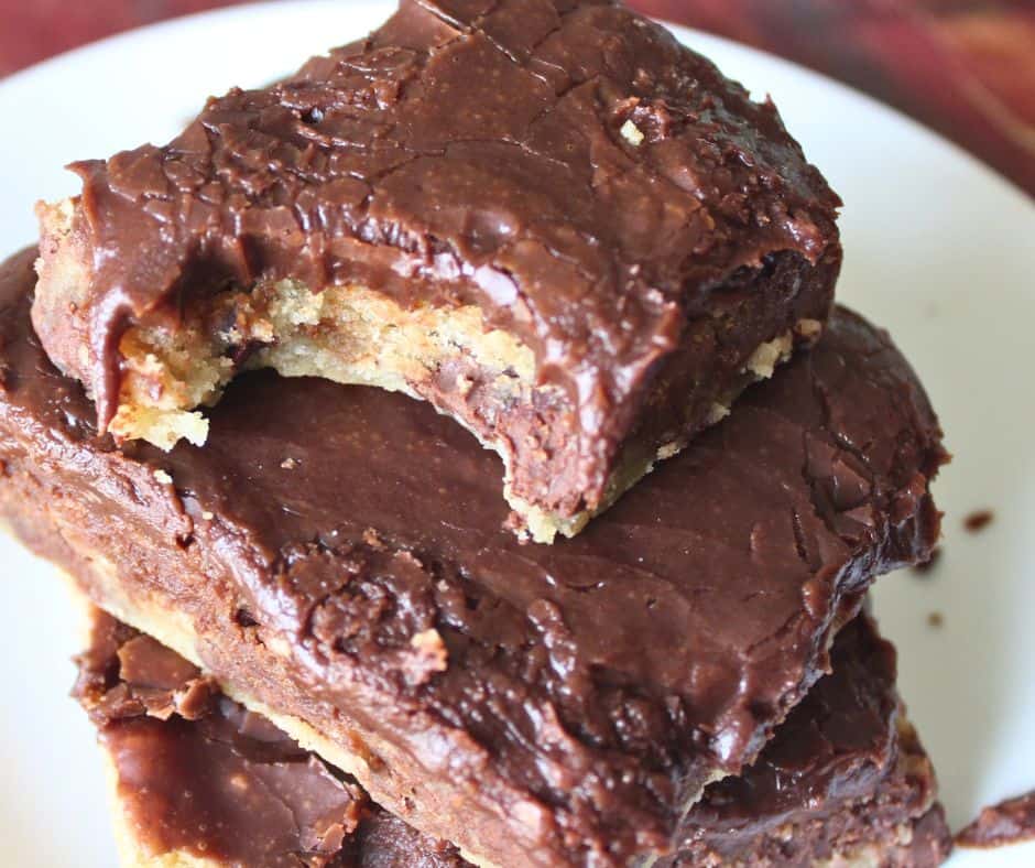 chocolate chip cookie bars stacked at an angle
